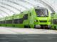 Groene Flixtrain-hogesnelheidstrein op een station in Duitsland
